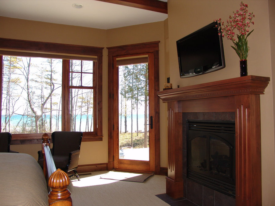 Warm and Cozy Master Bedroom with Large Windows