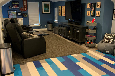 Mid-sized transitional enclosed vinyl floor and blue floor game room photo with blue walls