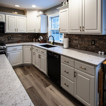 Custom Painted Kitchen Cabinetry, Updated Powder Room and Fireplace