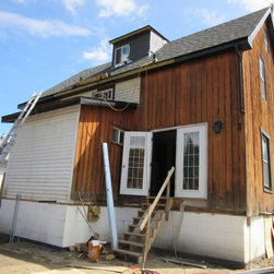 The Flood House - Roofing And Gutters