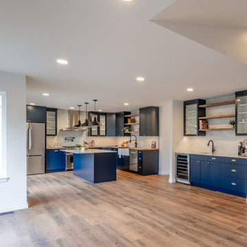 Open-Concept Great Room with Navy Kitchen and Seamless Social Flow