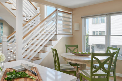 Example of a transitional dining room design in Other