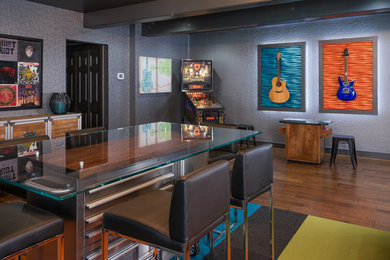 Dining room - large contemporary dark wood floor and brown floor dining room idea in Seattle with gray walls and no fireplace