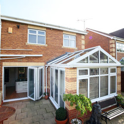 White Conservatory with PVCu Bi-Fold Doors - Products
