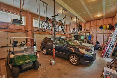 Inspiration for a huge craftsman attached garage remodel in New York