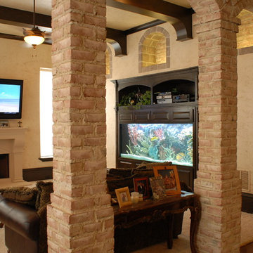 Saltwater Aquarium with Custom Coral Reef Insert in Family Room