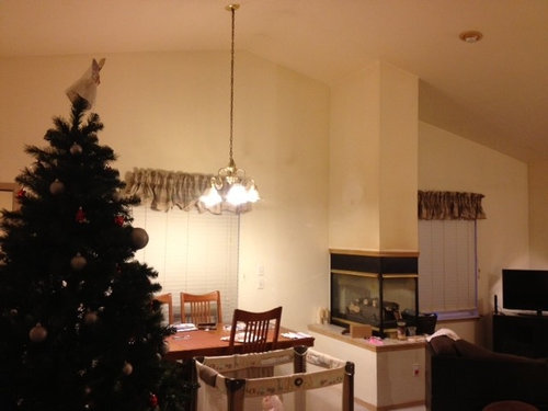 need help planning a living room around awkward fireplace. small budget