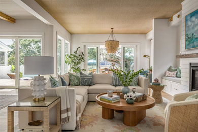 Living room - coastal living room idea in Charleston