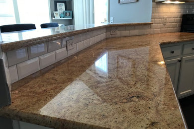 Kitchen - modern kitchen idea in Cleveland