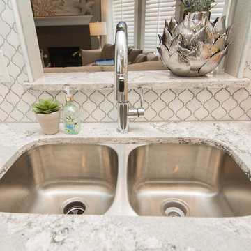 Kitchen | Two-Tone Cabinets | Cambria Quartz | Arabesque Marble Backsplash