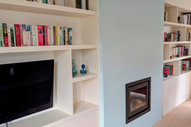 Inspiration for a medium sized modern living room in Gloucestershire with carpet and beige floors.