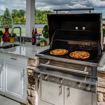 Luxurious White Outdoor Kitchen - Accented by Stone