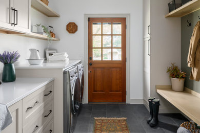 Example of a transitional laundry room design in Columbus