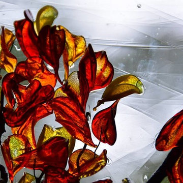 Kitchen stained glass window with flamed worked leaves.