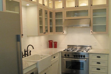 Example of a classic kitchen design in Other