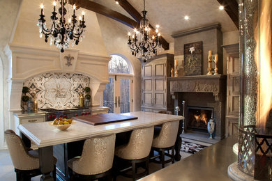 Eat-in kitchen - huge transitional limestone floor and beige floor eat-in kitchen idea in Other with an undermount sink, beaded inset cabinets, beige cabinets, white backsplash, marble backsplash, two islands and gray countertops