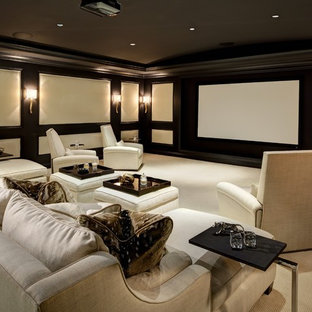 Medium sized traditional enclosed home cinema in Los Angeles with carpet, a projector screen, brown walls and beige floors.