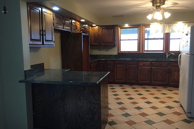 Honey oak kitchen that we refinished in a nice medium brow n