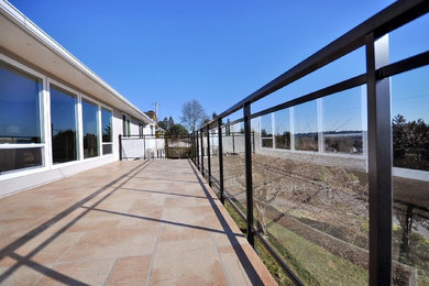 This is an example of a contemporary balcony in Vancouver.