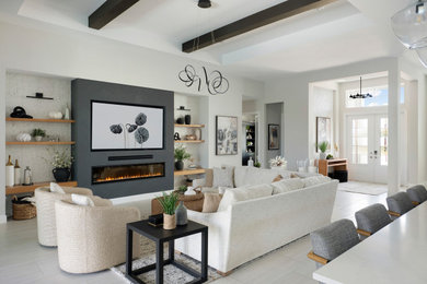 Living room - transitional open concept exposed beam, tray ceiling and gray floor living room idea in Miami with white walls, a ribbon fireplace and a wall-mounted tv