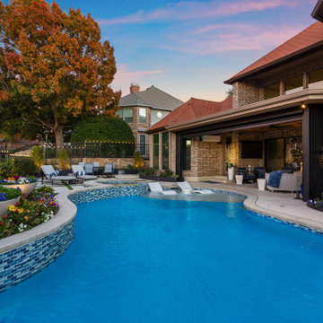 Custom Outdoor Living Pool Deck with Stamped Concrete & Turf