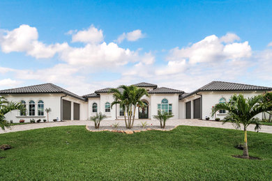 Photo of a large mediterranean home in Miami.