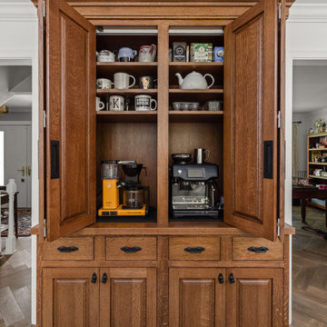 Warm Traditional Kitchen Remodel with Cream Cabinets & Herringbone Floors