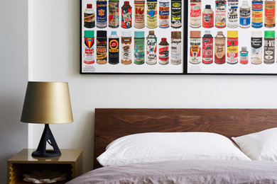 Inspiration for a contemporary bedroom remodel in New York with white walls