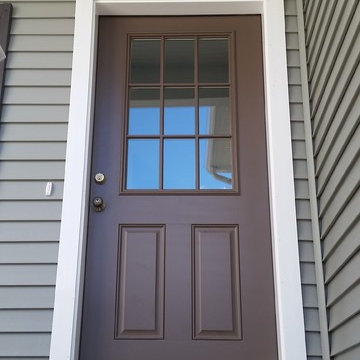 Home Addition in Fairhaven, MA features second floor, breezeway, and garage.
