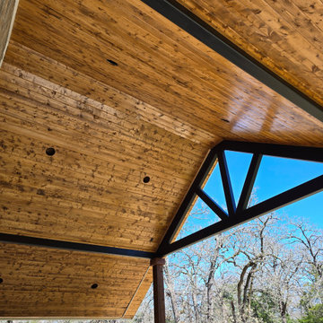 Stained Tongue-and-Groove Vaulted Ceiling with Contrast Timber Trusswork