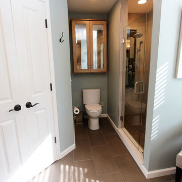 Transitional Masterbath with large sink, custom tiled shower and sitting area