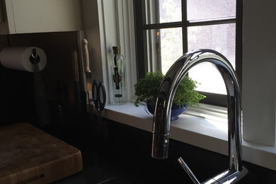 Example of a cottage kitchen design in Other