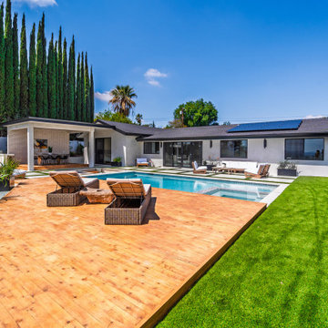 Sun Deck and Lawn Along the Full Rear Elevation