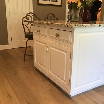 Pine cabinets refinished in Pure White