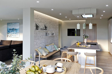 Medium sized contemporary open plan kitchen in Hampshire with flat-panel cabinets, grey cabinets, glass sheet splashback, integrated appliances, laminate floors, an island and grey floors.