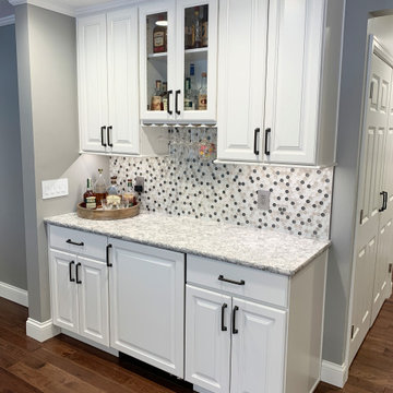 Open Concept Remodel in Rock Island With Walls Removed and a Custom Entry Bench