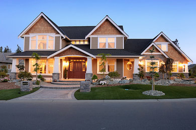 Minimalist brown two-story wood exterior home photo in Vancouver