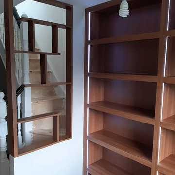 Walnut book shelving.