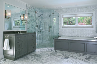 Example of a large transitional master gray tile, white tile and stone tile marble floor bathroom design in San Francisco with gray cabinets, gray walls, recessed-panel cabinets, an undermount sink and granite countertops