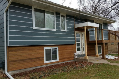 Photo of a modern exterior in Minneapolis with concrete fiberboard siding.