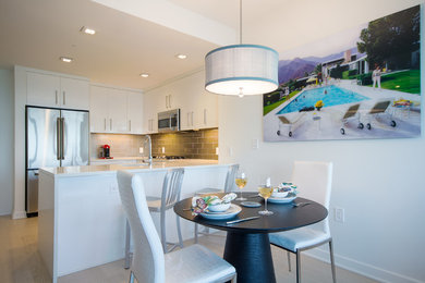 Example of a transitional dining room design in New York