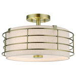 Livex Lighting - Blanchard 3-Light Antique Brass Large Semi-Flush - The Blanchard semi-flush mount adds refined style and a hint of mystery to your d�cor. The antique brass finish and an oatmeal handcrafted hardback shade create warm illumination, while soft light brings to life the intricate fretwork pattern. This medium three-light semi flush mount will add a sophisticated and glamorous look to almost any interior design style. It will work great in the living room, hallway, over the dining or kitchen table and the bedroom.