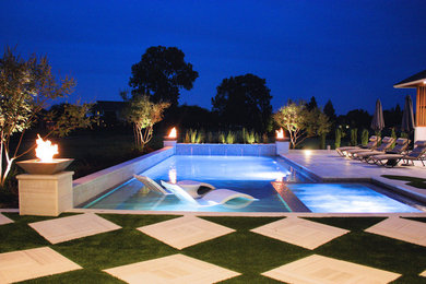 Pool house - mid-sized contemporary backyard rectangular and concrete paver lap pool house idea in New Orleans