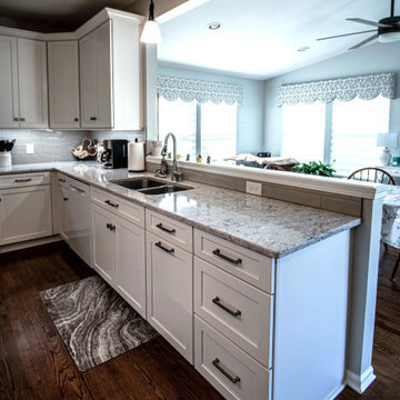 White Shaker Kitchen w/ Pietra Quartz Countertops & Gray Subway Tile Backsplash