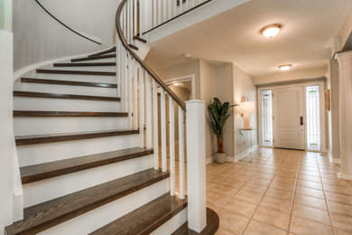 Example of a trendy staircase design in Toronto