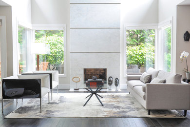 Inspiration for a mid-sized modern formal open concept living room in Vancouver with white walls, dark hardwood floors and a standard fireplace.
