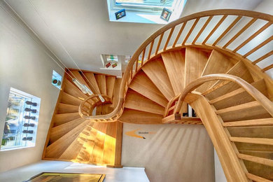Two curved solid Oak bespoke staircases