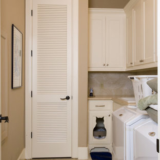 Design ideas for a medium sized bohemian l-shaped separated utility room in Houston with a built-in sink, shaker cabinets, white cabinets, composite countertops, beige walls, ceramic flooring and a side by side washer and dryer.
