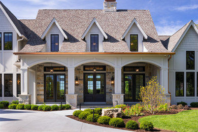 Example of a french country exterior home design in Minneapolis