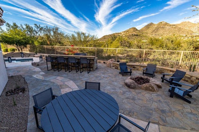 Patio kitchen - mid-sized contemporary backyard patio kitchen idea in Phoenix